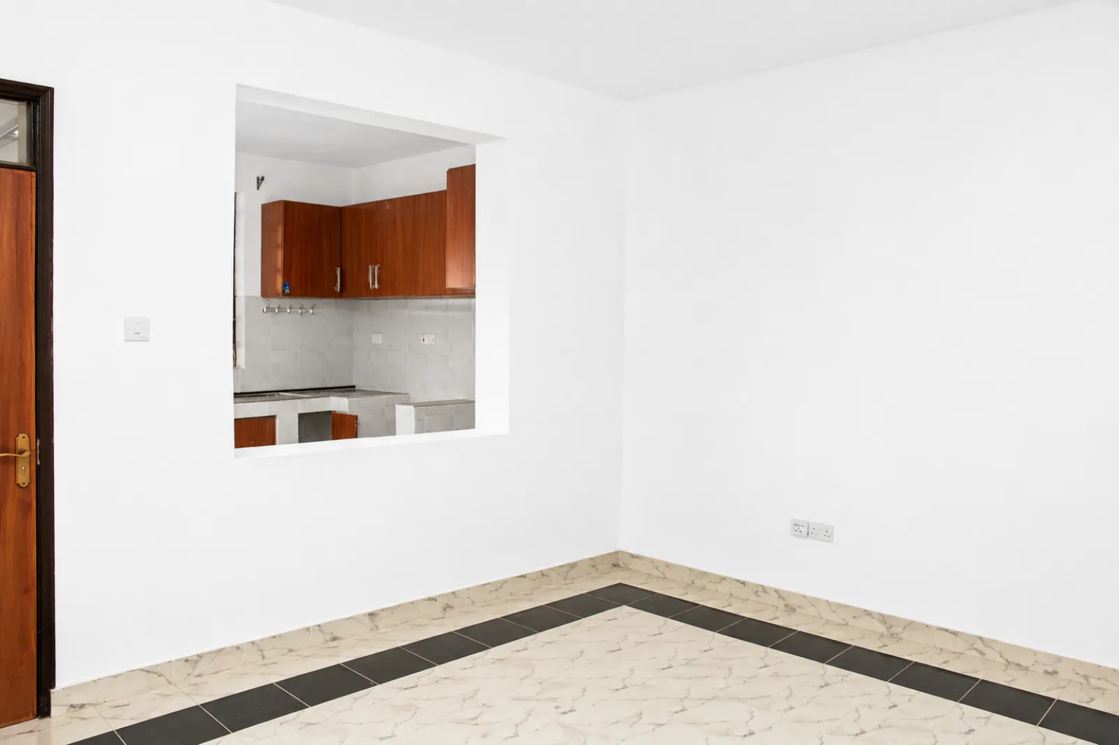 Living room hatch through to the kitchen