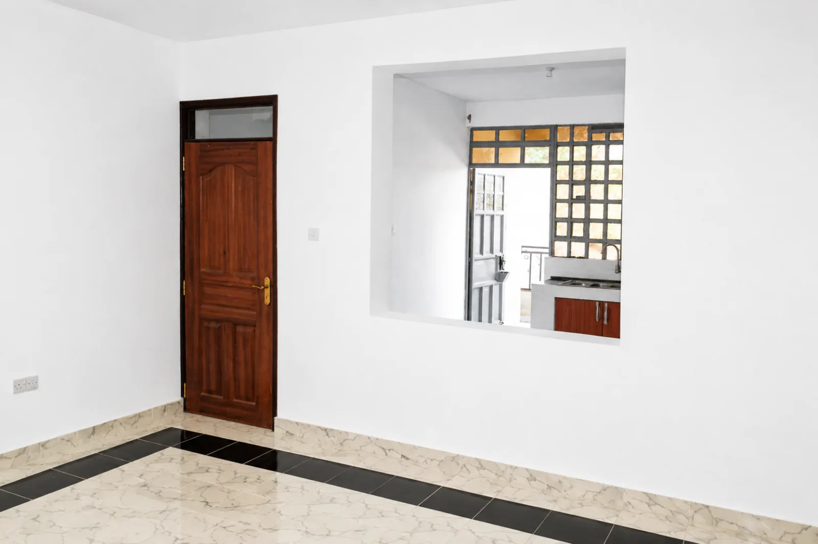 One-bedroom living room with kitchen serving hatch